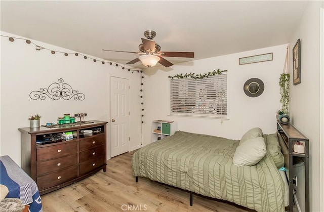 47384 Veater Ranch Rd, Coarsegold, CA 93614 - bedroom with wood finished floors and a ceiling fan