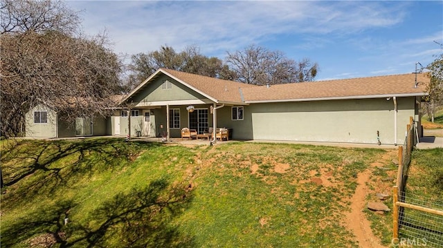 47384 Veater Ranch Rd, Coarsegold, CA 93614 - back of house with stucco siding, a patio area, and a yard