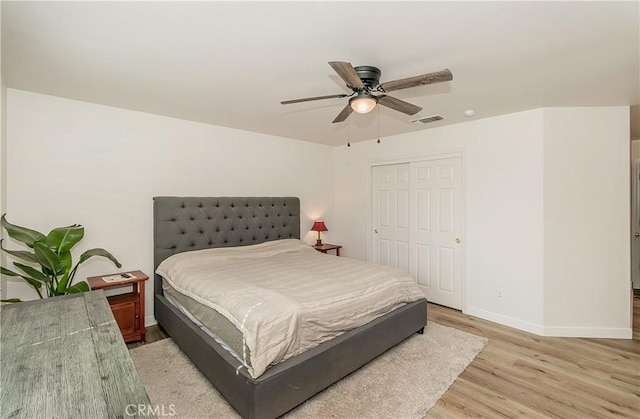 47384 Veater Ranch Rd, Coarsegold, CA 93614 - bedroom featuring light wood-style floors, baseboards, ceiling fan, and a closet