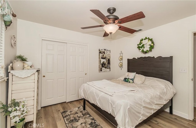 47384 Veater Ranch Rd, Coarsegold, CA 93614 - bedroom with a closet, light wood finished floors, and a ceiling fan