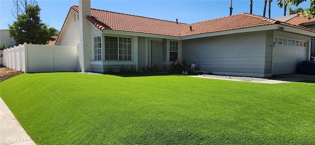 27865 Quincy St, Castaic, CA 91384 - view of front facade featuring a tile roof, an attached garage, a chimney, and concrete driveway