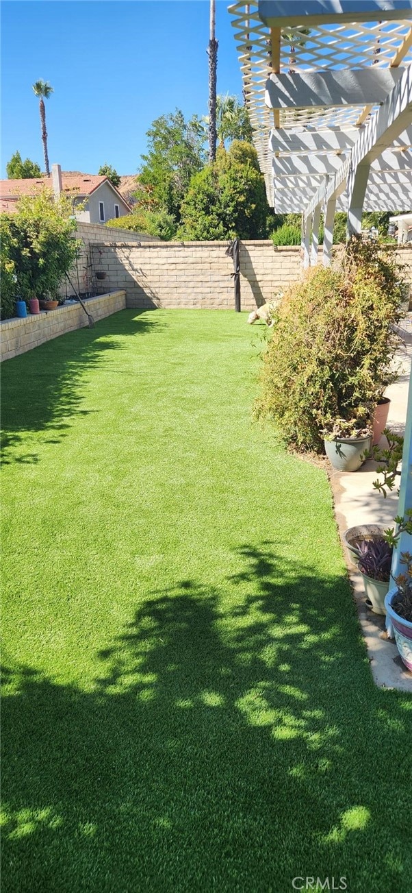 27865 Quincy St, Castaic, CA 91384 - fenced backyard featuring a pergola