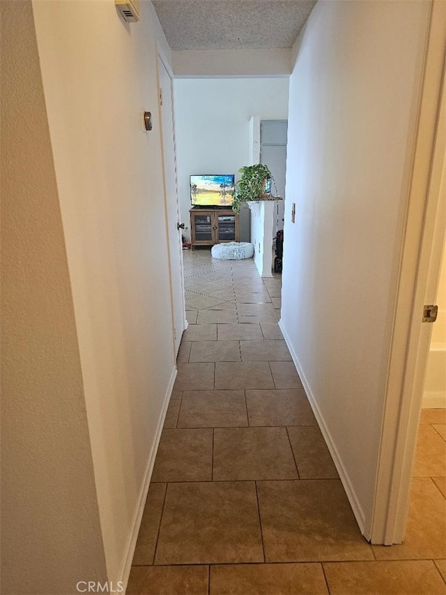 27865 Quincy St, Castaic, CA 91384 - hallway with tile patterned floors