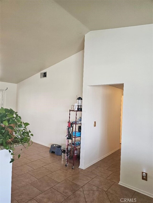 27865 Quincy St, Castaic, CA 91384 - hallway with lofted ceiling and tile patterned flooring