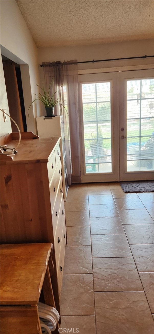 27865 Quincy St, Castaic, CA 91384 - entryway featuring healthy amount of natural light, a textured ceiling, and french doors