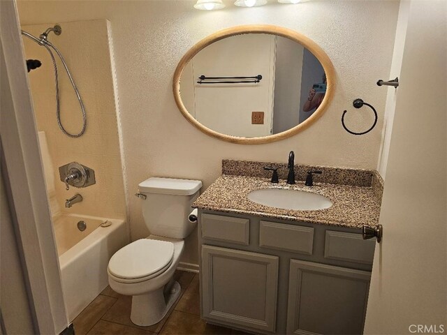27865 Quincy St, Castaic, CA 91384 - full bathroom featuring vanity,  shower combination, tile patterned flooring, and a textured wall