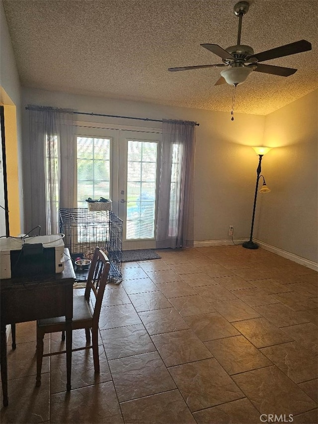 27865 Quincy St, Castaic, CA 91384 - dining room featuring a ceiling fan, a textured ceiling, and french doors