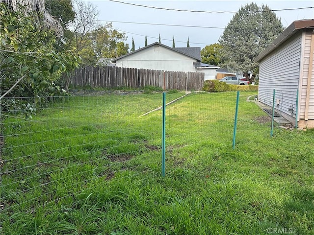 view of yard with fence