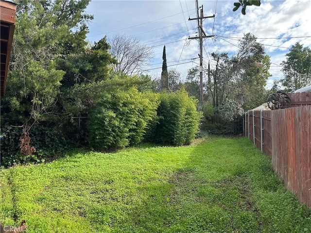 view of yard with fence