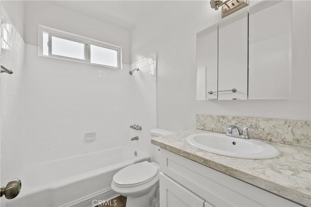 full bath featuring vanity, toilet, and shower / bathtub combination