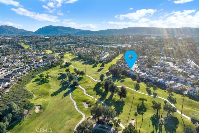 birds eye view of property featuring a mountain view