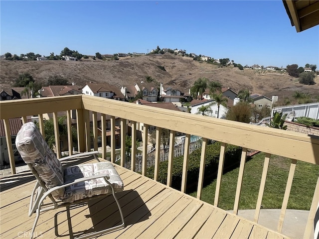 wooden deck featuring a residential view