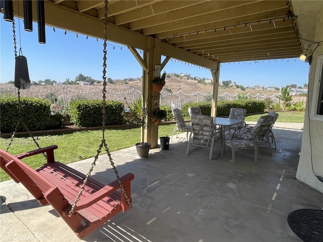 view of patio / terrace featuring a fenced backyard and outdoor dining space