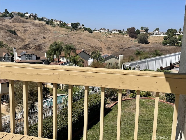 view of yard featuring a residential view and fence