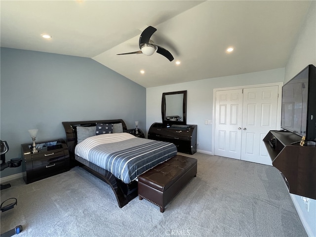 carpeted bedroom with baseboards, lofted ceiling, ceiling fan, a closet, and recessed lighting