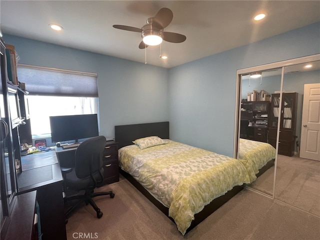 bedroom with carpet floors, recessed lighting, a closet, and a ceiling fan