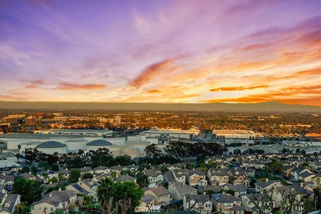 aerial view at dusk with a residential view