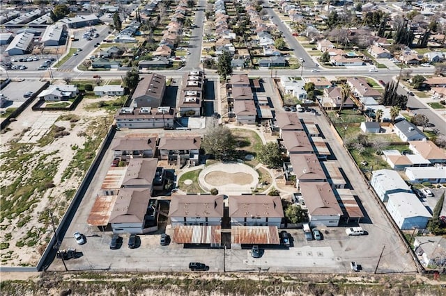 birds eye view of property with a residential view