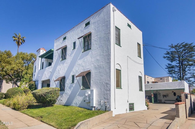 exterior space with stucco siding