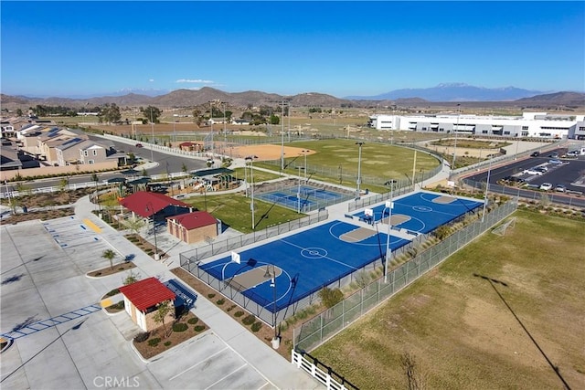 birds eye view of property with a mountain view