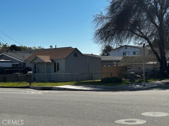 view of side of property with a fenced front yard