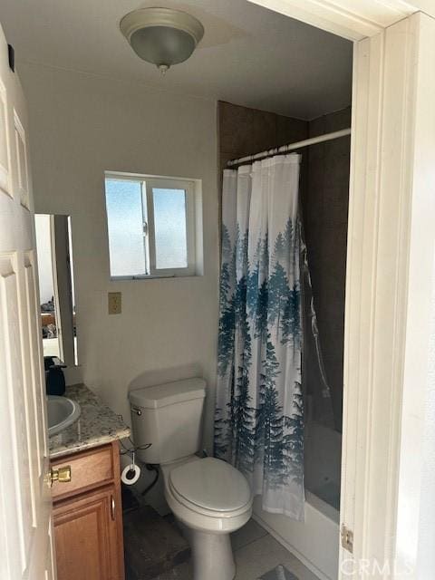 full bathroom featuring shower / tub combo, vanity, tile patterned flooring, and toilet
