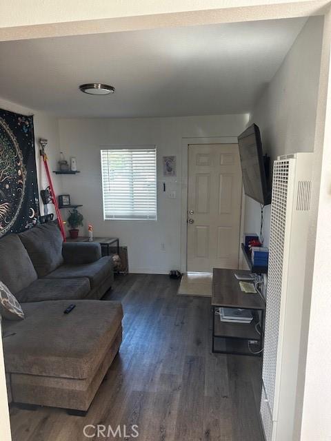 living area featuring wood finished floors