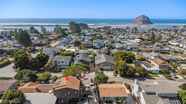 bird's eye view with a water view and a residential view