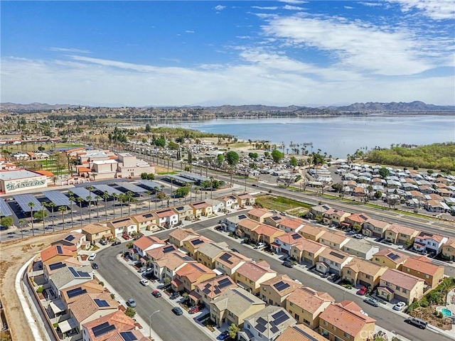 aerial view with a residential view and a water view