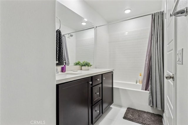 bathroom featuring shower / bath combination with curtain, recessed lighting, vanity, and tile patterned floors