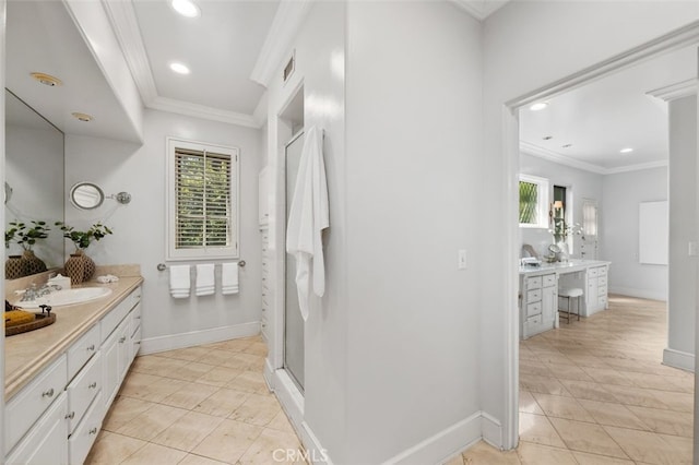 bathroom featuring visible vents, crown molding, and vanity