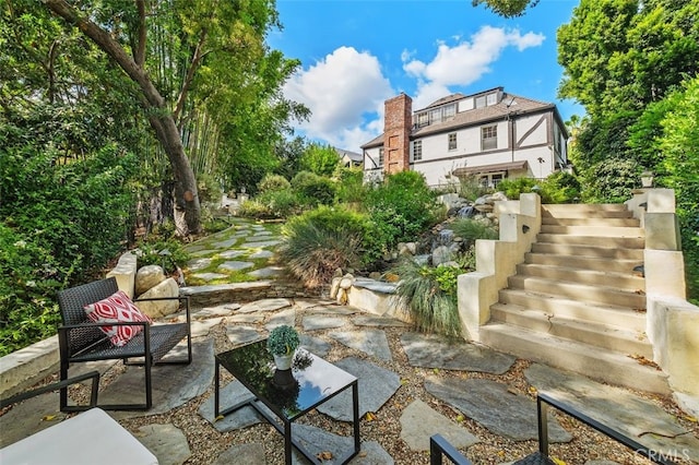 view of patio / terrace with stairs