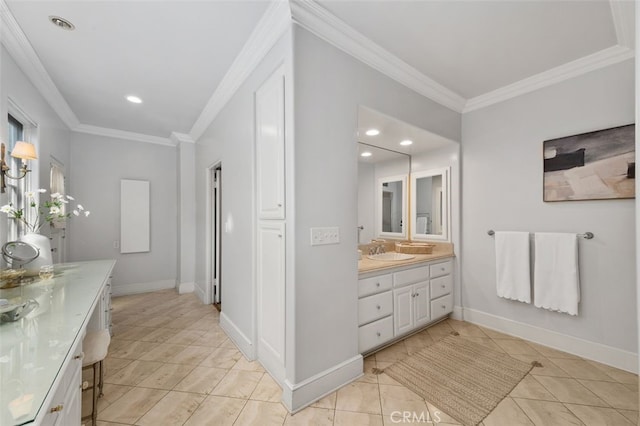 bathroom featuring baseboards, ornamental molding, tile patterned flooring, and vanity