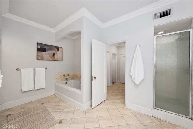 full bathroom featuring a stall shower, visible vents, baseboards, ornamental molding, and a garden tub