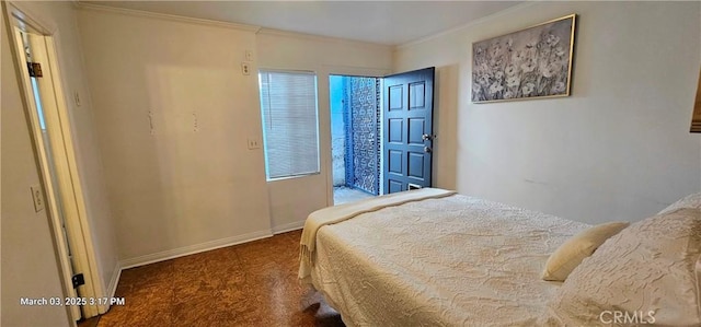 bedroom featuring ornamental molding and baseboards