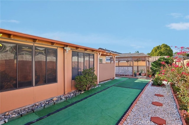 view of yard featuring fence