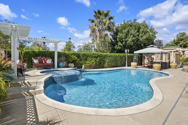 view of swimming pool with a gazebo, a patio area, a pergola, and a pool with connected hot tub