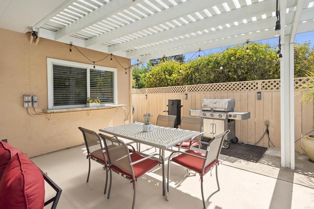 view of patio / terrace with outdoor dining space, fence, a pergola, and a grill