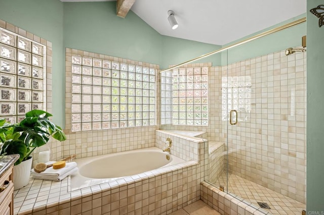 full bathroom with lofted ceiling with beams, a stall shower, and a bath