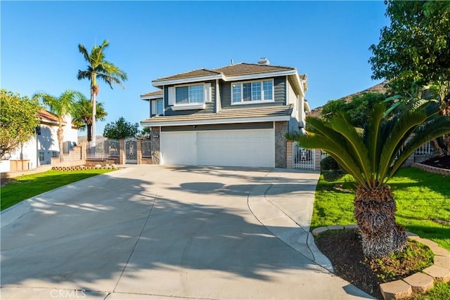 view of front of home with a garage, stone siding, concrete driveway, and a gate