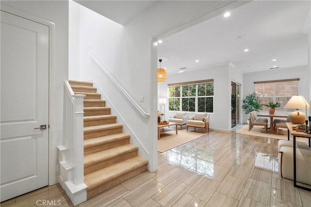 stairway featuring recessed lighting and baseboards