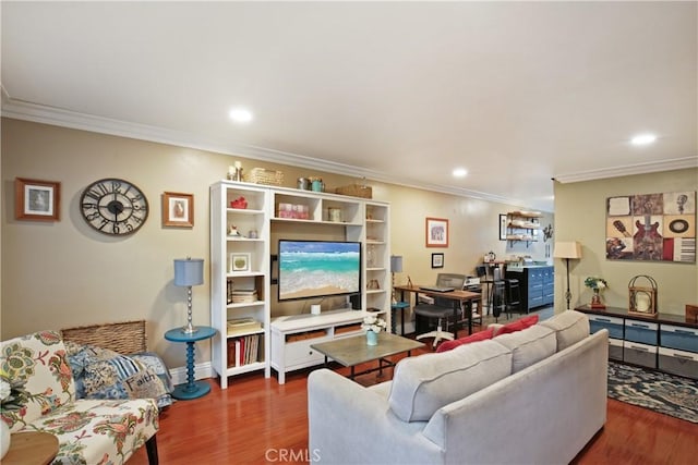 living room with recessed lighting, wood finished floors, and crown molding