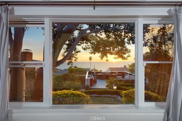 entryway with a water view