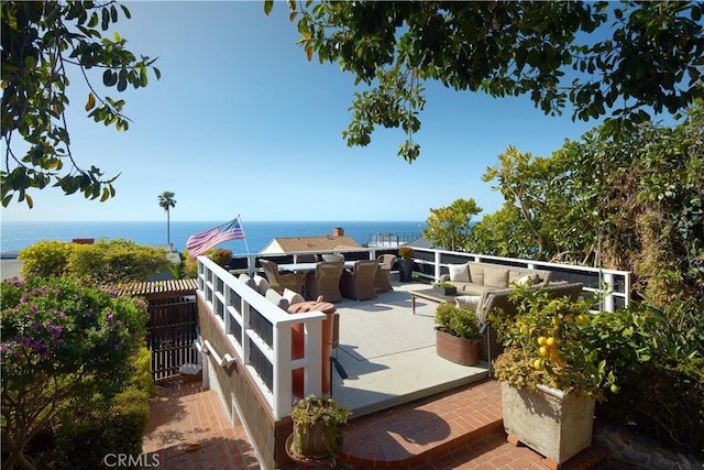 view of patio / terrace with a water view