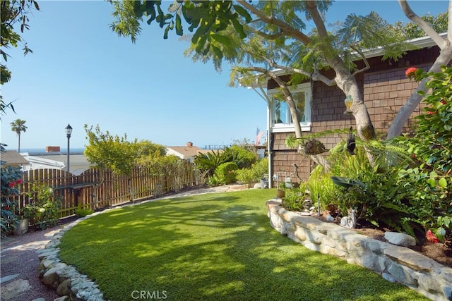 view of yard featuring fence