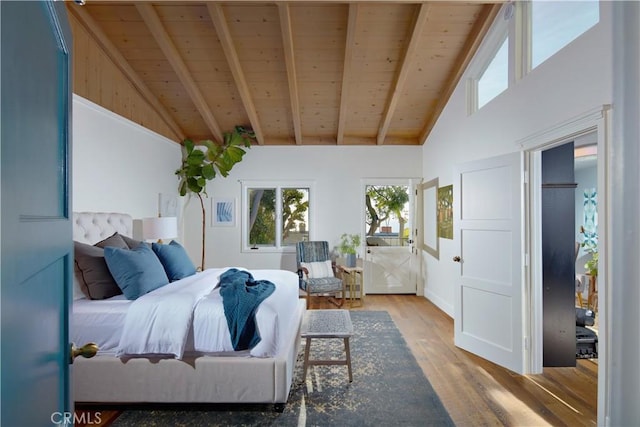 bedroom featuring wood ceiling, wood finished floors, and beam ceiling