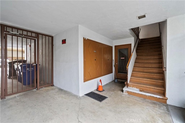 entrance to property featuring visible vents