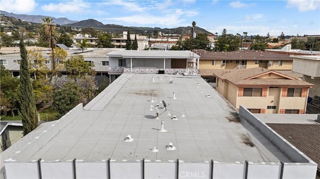 birds eye view of property featuring a residential view and a mountain view