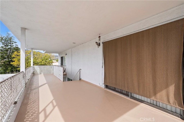 view of patio / terrace with a balcony