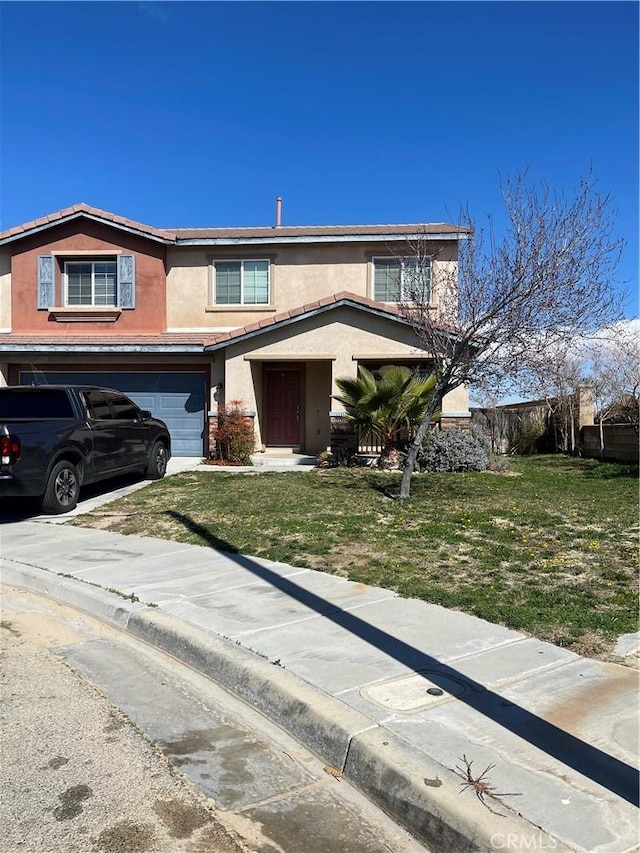 traditional-style home featuring a garage, fence, concrete driveway, stucco siding, and a front lawn